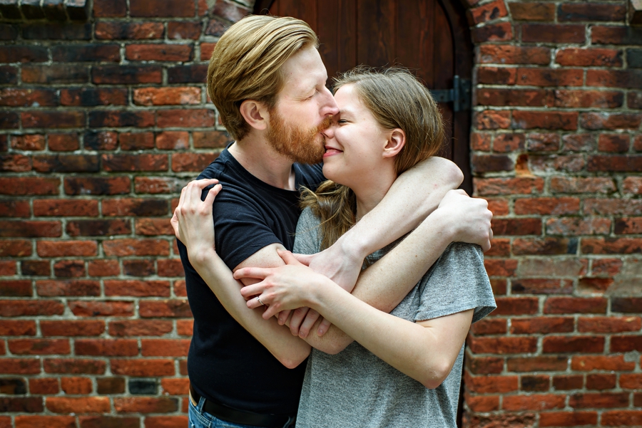 A man kisses his fiance's nose during their philadelphia engagement session.